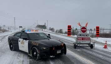 A police cruiser blocks a road closed in South Bruce. Photo provided by South Bruce OPP.