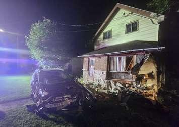 A vehicle collided with a home on Sir Johns Crescent in Georgian Bluffs, July 17, 2024. Photo provided by Grey Bruce OPP