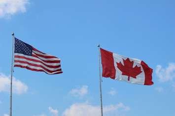 American & Canadian flags at Blue Water Bridge. (BlackburnNews.com photo by Dave Dentinger)