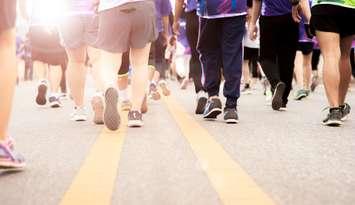 Group walking together (Image courtesy of sataporn_chayawan/	iStock / Getty Images Plus via Getty Images)