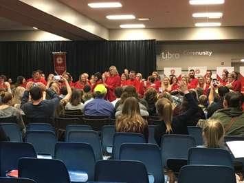 The first ever graduating class of the Huron-Bruce Fanshawe campuses stand and applaud their families for their support at their graduation ceremony inside Libro Community Hall within the Central Huron Community Centre in Clinton. October 16th, 2017 (Photo by Ryan Drury)