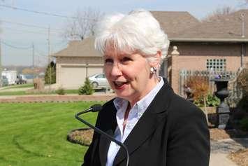 Windsor Ward 6 Councillor Jo-Anne Gignac speaks to the media outside of her home on St. Rose Ave., April 29, 2015. (Photo by Mike Vlasveld)