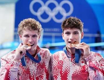 Rylan Wiens and Nathan Zsombor-Murray win bronze in men’s synchronized 10m platform event. July 29, 2024. (Photo courtesy of Mark Blinch/COC via Instagram)