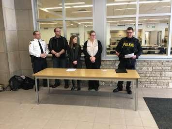 L-R: OPP Staff Sergeant Stephan Pilon, Chuck Ellison, President of Perth Huron Insurance Brokers, Jessica Johnson, North Perth Executive Coordinator and Policy Assistant, Becky Beuerman, Vice President of Perth Huron Insurance Brokers, and OPP Officer Barry Cookson, Media Relations and Community Safety officer in North Perth, all unveiling the vehicle theft prevention awareness student contest at Listowel District Secondary School. March 7th, 2019. (Photo by Ryan Drury)