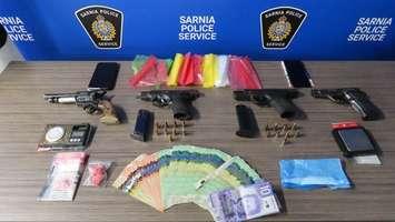 Items seized during a drug trafficking raid at a Sarnia townhome. July 20, 2023. Photo supplied by Sarnia police.
