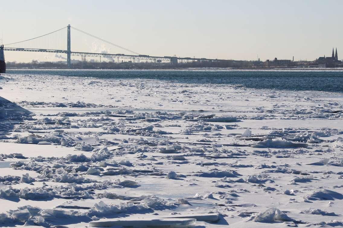 BlackburnNews.com file photo of the Ambassador Bridge along the Detroit River.  (Photo by Jason Viau)