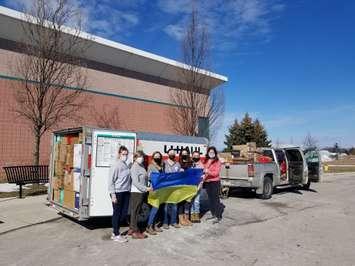 Volunteers send of a trailer full of donations from Goderich headed to Ukraine. (Photo courtesy of Huron County Hub for Ukraine via Facebook)
