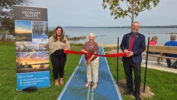  Sarawak Park Ribbon Cutting - Deputy CAO Brittany Drury, Mayor Sue Carleton, CAO Niall Lobley at Mobi-mat and Tree Planting. Photo from Georgian Bluffs. 