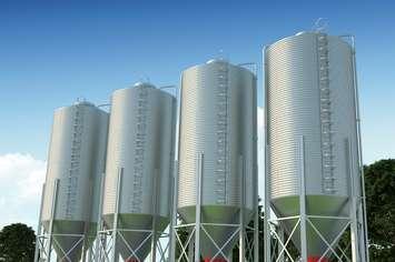 Photo of grain silos by KangeStudio/iStock / Getty Images Plus