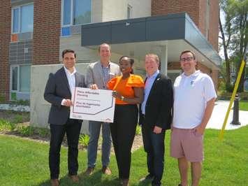 (From left to right) London North Centre MP Peter Fragiskatos, Indwell CEO Jeff Neven, London-West MP Arielle Kayabaga, London Mayor Josh Morgan, Ward 1 Councillor Hadleigh McAlister at the unveiling of 403 Thompson Road. July 10, 2023. Photo by Craig Needles, Blackburn Media. 