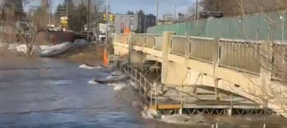 High water levels and debris at the Durham Street Bridge in Walkerton. Photo courtesy of Christine Clark.