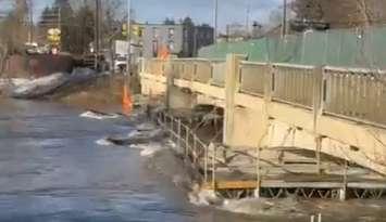 High water levels and debris at the Durham Street Bridge in Walkerton. Photo courtesy of Christine Clark.