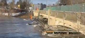 High water levels and debris at the Durham Street Bridge in Walkerton. Photo courtesy of Christine Clark.