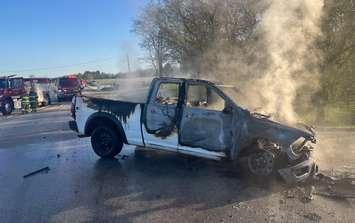 A pickup truck caught fire after a two-vehicle crash at Bruce Road 3 and Brant-Elderslie Townline, May 9, 2025. Photo provided by South Bruce OPP.
