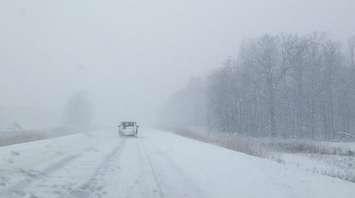 Snow covered road file photo courtesy of Amanda Rand.