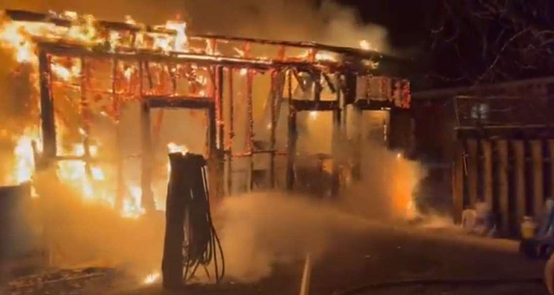 Firefighters work to extinguish a garage fire on Hudson Drive, March 12, 2024. Photo courtesy of the London Fire Department.