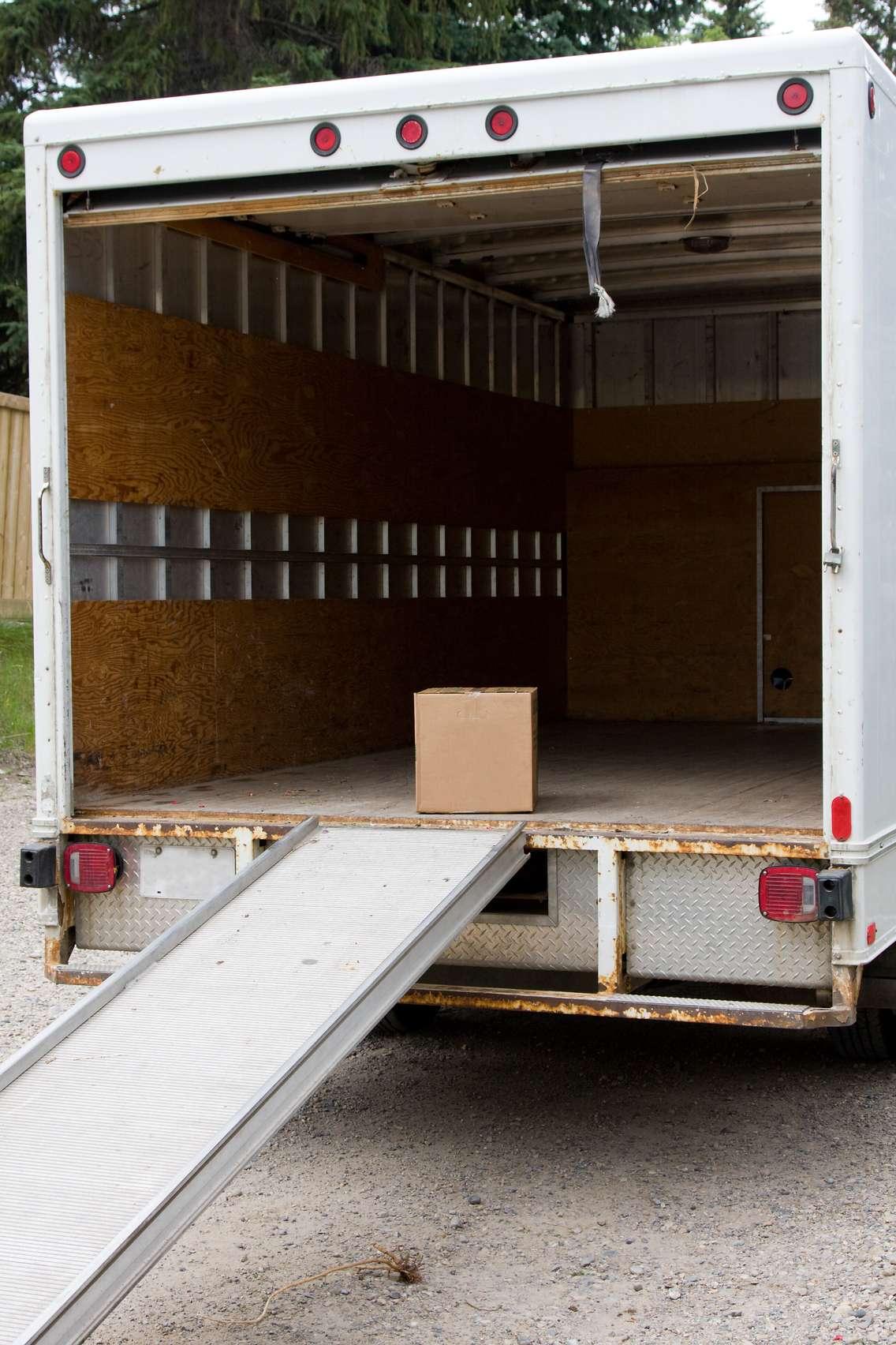 Moving van © Can Stock Photo / bradcalkins