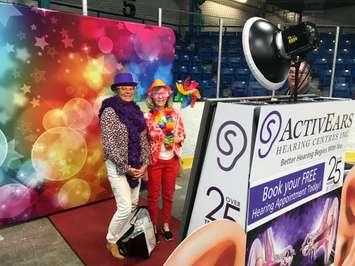 Marjorie Cain and Catherine Van Bastelaar, friends from Corunna, dress up in costumes at the Active Ears Hearing Centres photo booth at Sarnia's Age Friendly Expo. June 13, 2019 Photo by Melanie Irwin.
 

