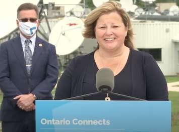 Huron-Bruce MPP and Minister of Agriculture, Food and Rural Affairs, Lisa Thompson, speaks at the funding announcement for Telesat and their Light Speed satellite project at their operations centre near Hanover. Bill Walker, the MPP for Bruce-Grey-Owen Sound, stands behind her. Walker hosted the announcement which was also attended by Vic Fedeli, Minister of Economic Development, Job Creation and Trade and Kinga Surma, Minister of Infrastructure and Daniel Goldberg, President and CEO of Telesat. (Blackburn News file photo)