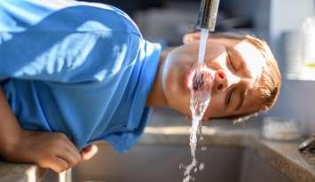 Child drinking water.  Credit Getty Images.  LSOphoto
