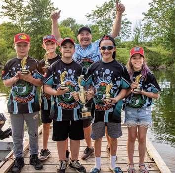 Mike Sklad (center) is bringing youth fishing leagues to five communities this summer, including Wingham and London. (Photo courtesy of Fishing Friendzy)