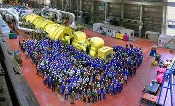 Workers gather on the Unit 6 floor at the Bruce B Station, marking its official shut down as the first major component replacement begins. Photo courtesy of Bruce Power.