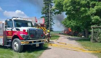 Emergency crews on scene of a structure fire on Concession 10 outside of Teeswater, June 24, 2025. Photo provided by South Bruce OPP.