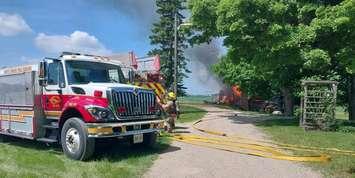 Emergency crews on scene of a structure fire on Concession 10 outside of Teeswater, June 24, 2025. Photo provided by South Bruce OPP.