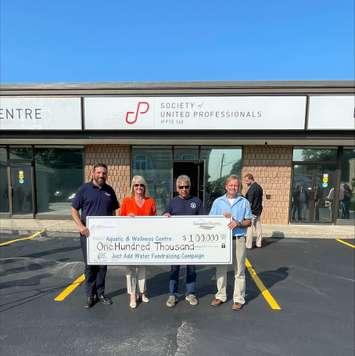 From left to right: Luke Charbonneau, Mayor of Saugeen Shores, Michelle Johnston, SUP President, Rob Stanley, AWC Fundraising Coordinator, and, Dave Ceksters, SUP Bruce Power Local Vice President. Photo from Saugeen Shores