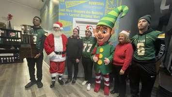 The DWBIA lays out the details of the downtown Windsor Santa Claus parade, November 14, 2024. (Photo by Maureen Revait) 