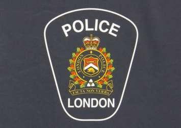 London Police logo blue (photo by Tamara Thornton, Blackburn Media)