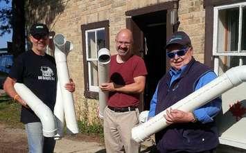 Barry Randall (Walkerton), Bruce Davidson (Walkerton), and Jack MacLeod (Hanover) holding Fish Line Receptacles. (photo submitted)