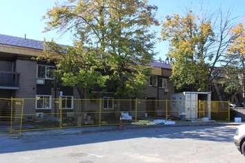 Work continues at 99 McNaughton Avenue West after a fire. Photo taken October 24, 2024. (Photo by Matt Weverink)