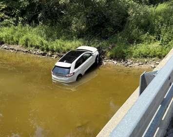 A vehicle crashed into a ravine off Perth Line 20, July 15, 2025. Photo provided by Perth OPP.