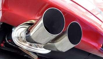 A dual exhaust muffler. File photo courtesy of © Can Stock Photo / Pixelia29