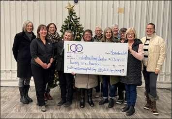 100 Women Who Care.  Left to Right – Mary Anne Alton, Roni Delleman, Community and Family Services Manager, Salvation Army, Heidi Tones, Major Mary Millar, Salvation Army, Karen Baker, Elaine Bell, Josie Myles, Jean Kirby, Lisa Osborne, Lynda Legge and Christine Arezzi. Photo from 100 Women Who Care