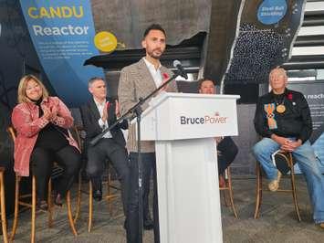 Stephen Lecce, Ontario Minister of Energy and Electrification, makes an announcement in front of Lisa Thompson, Huron-Bruce MPP; James Scongack, COO and Executive Vice President at Bruce Power; Chief Conrad Ritchie, Chippewas of Saugeen First Nation; and Chief Greg Nadjiwon, Chippewas of Nawash Unceded First Nation. (Photo by Eric Thompson)