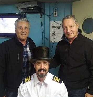Captain Ted Brown with the traditional top hat (centre), flanked by Goderich Administrator Larry McCabe and Director of Operations Chip Wilson. (photo submitted)  