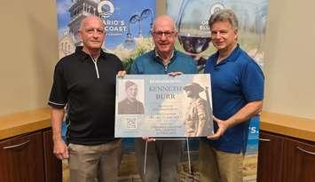 Tom St. Amand (L), Doug Woods, and Tom Slater (R) display a sign for the 'Sarnia War Remembrance Sign Project' - Oct. 22/24 (Blackburn Media Photo by Josh Boyce)