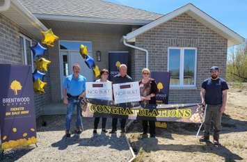 Picture – from the left is Norbert Bolger (President/Owner NOR-Built Construction), Kelly Mickle (Winner), David Mickle (Winner), Elizabeth Dulmage (Executive Director – Brentwood Recovery Home) and Chase Goodfellow (NOR-Built Construction). 