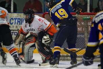 Ironmen forward Travis Donaldson stands in front of the Essex net in Game 4 of the Schmalz Cup Semi-Final in Wingham.  Darien Ekblad is the Essex goalie.  (Picture by John Marshall.)