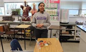Assumption High School Grade 10 student Sohila Sidhu presents her science project. (Provided by the WECDSB)  