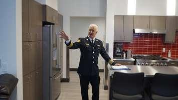 Fire Chief Bryan Van Gaver shows kitchen and conjoined living room at new Colborne Road station. January 30, 2024. (Photo by Natalia Vega) 