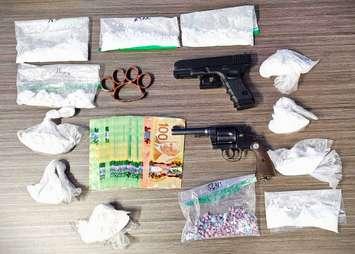 Weapons and drugs seized from a Confederation Line residence - April 25/24 (Photo courtesy of Sarnia Police Service)