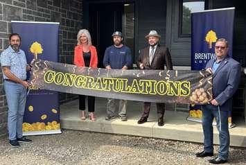 From left, Brentwood Board Vice-Chair Allen Provost, Executive Director Sonja Grbevski, Chase Goodfellow of NOR-Built Construction, David Taylor, and Brentwood board member Scott Collier celebrate Taylor's win in the Brentwood Dream Lottery in Amherstburg, June 6, 2025. Photo courtesy Brentwood Recovery Home.