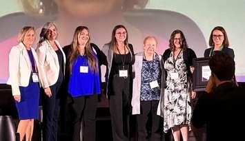  Grey County staff accepted the Innovation and Excellence Workplace Quality award for the Long-Term Care Colour It Coach program at the AdvantAge Ontario conference in Toronto on May 1. From left to right: Tulia Ferreira – CEO for Surge Learning, Jennifer Cornell - Director of Long-Term Care, Alicia Meesters – Colour It Coach, Alexus Konstantinou – Colour It Coach, Nancy Smallegange – Colour It Coach, Sara Gibson – Colour It Coach, Stephanie Matos – Student Placement Coordinator.