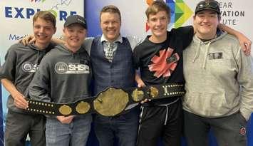 Science Olympics winning team.jpg – Champions of the second-annual NII Explore Science Olympics from Goderich District Collegiate Institute. [L-R] Jacob Watson, Justin MacLeod, NII Explore President Phillip Craig, Sam Howard, Kellen Brenner. Photo from NII