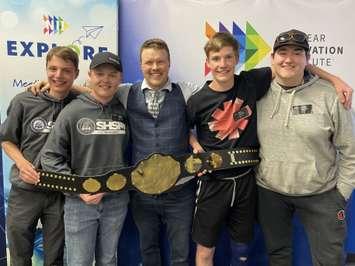 Science Olympics winning team.jpg – Champions of the second-annual NII Explore Science Olympics from Goderich District Collegiate Institute. [L-R] Jacob Watson, Justin MacLeod, NII Explore President Phillip Craig, Sam Howard, Kellen Brenner. Photo from NII