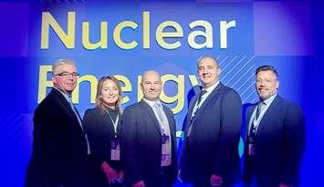 David Campbell, Katie Merchant, Andy Rutledge, Michael Bonaventura and Chief Nuclear Officer Chris Mudrick accepting the TIP award, September 10, 2024. Photo provided by Bruce Power.