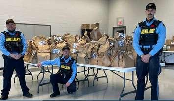 The Huron County Ontario Provincial Police (OPP) Auxiliary Unit held a successful "Stuff-a-Cruiser" food drive in Goderich. Photo from Huron OPP.